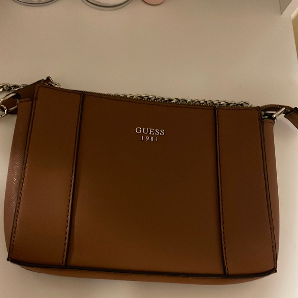 This is a Guess cross body bag barely used!!